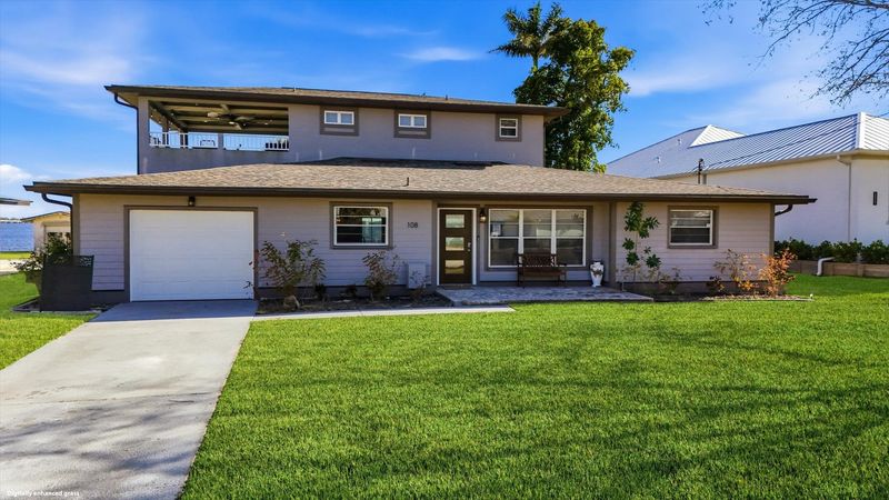 Gorgeous 4 bedroom, 3 bathroom, 2 story waterfront home with private pool on Peace River in Punta Gorda, FL
