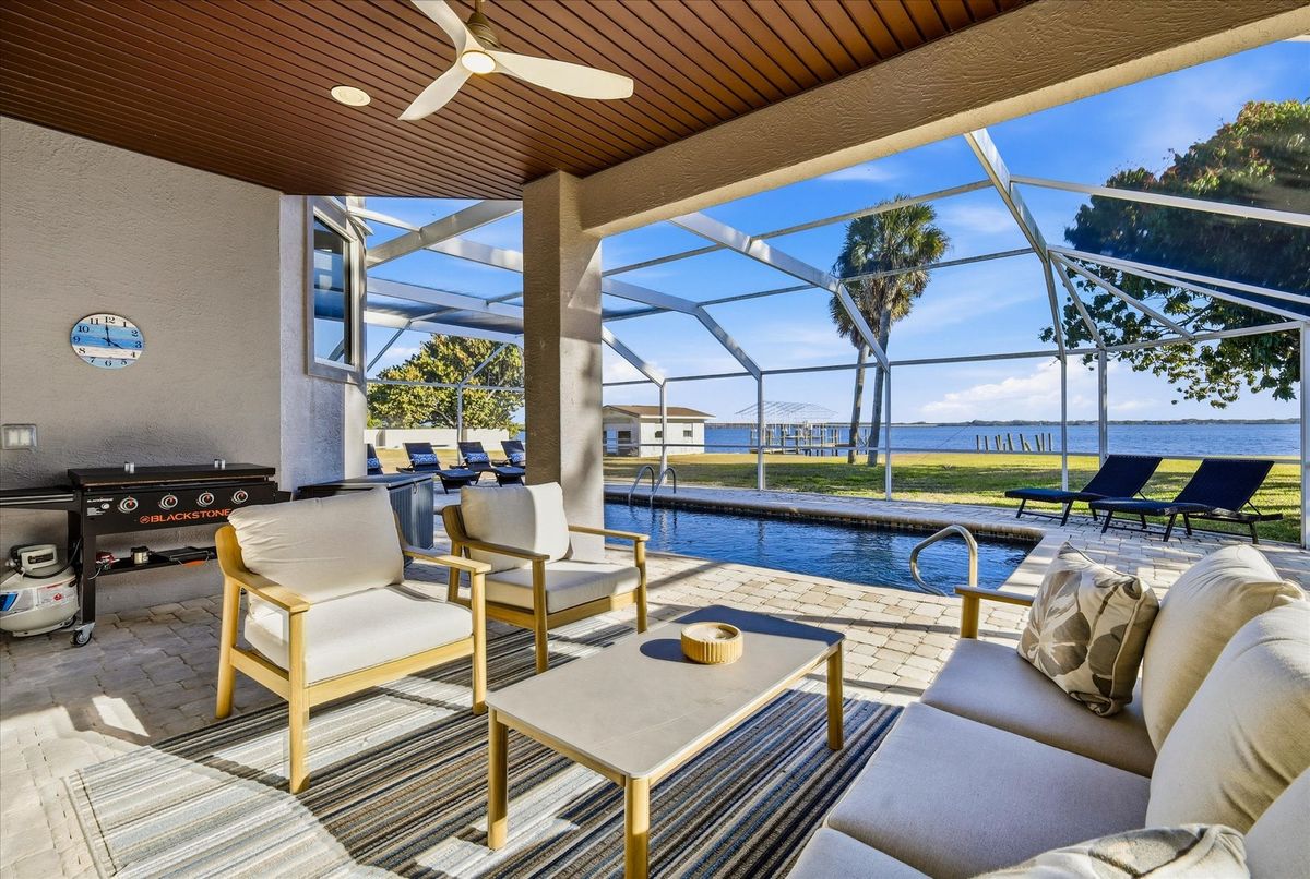 Gorgeous 4 bedroom, 3 bathroom, 2 story waterfront home with private pool on Peace River in Punta Gorda, FL