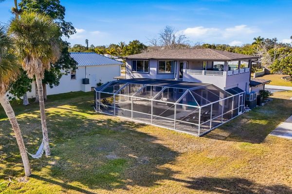 Gorgeous 4 bedroom, 3 bathroom, 2 story waterfront home with private pool on Peace River in Punta Gorda, FL