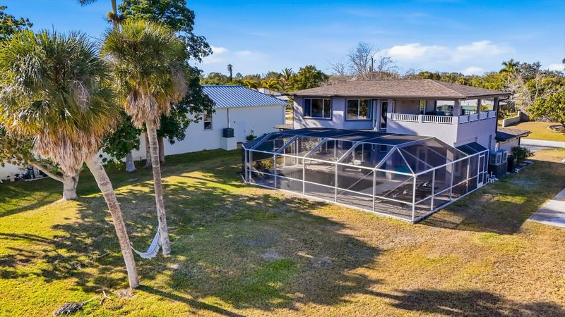 Gorgeous 4 bedroom, 3 bathroom, 2 story waterfront home with private pool on Peace River in Punta Gorda, FL