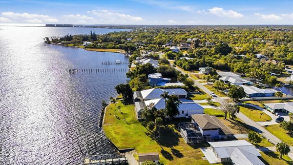 Gorgeous 4 bedroom, 3 bathroom, 2 story waterfront home with private pool on Peace River in Punta Gorda, FL