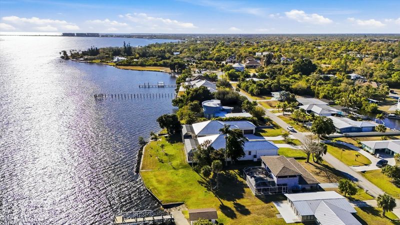 Gorgeous 4 bedroom, 3 bathroom, 2 story waterfront home with private pool on Peace River in Punta Gorda, FL