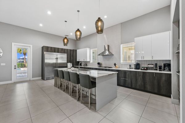 The breakfast bar has seating for up to 5 guests
