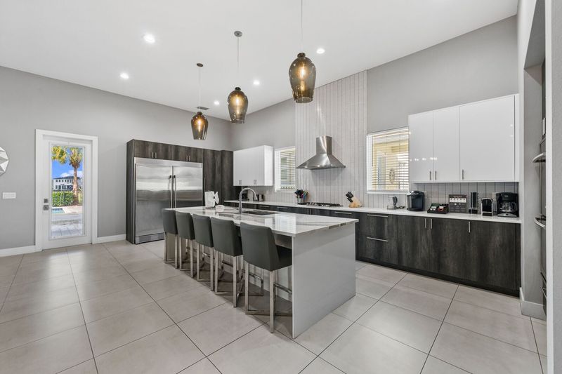 The breakfast bar has seating for up to 5 guests