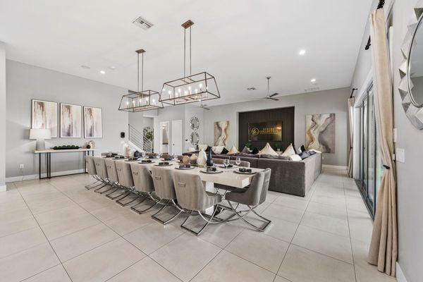 The formal dining table has seating for up to 16 guests