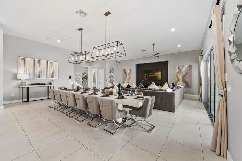 The formal dining table has seating for up to 16 guests