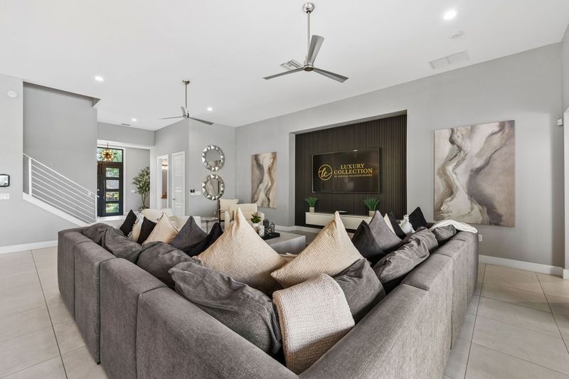 Plenty of comfortable seating options for everyone to gather around the SMART TV