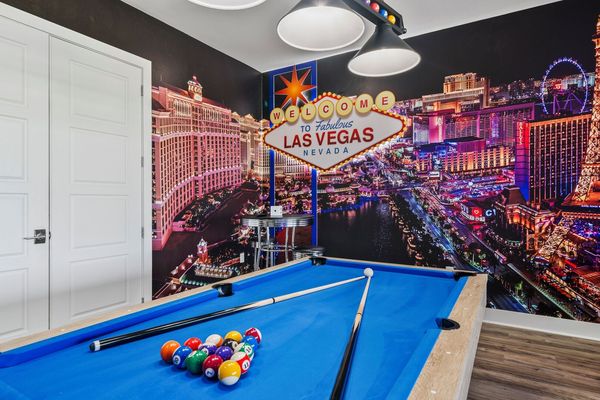 Host a friendly game of pool with friend and family