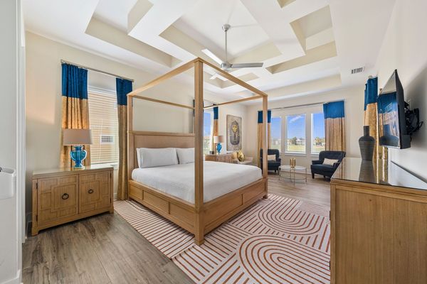 The upstairs Egyptian themed master suite with a sitting area to enjoy a nightcap before bed