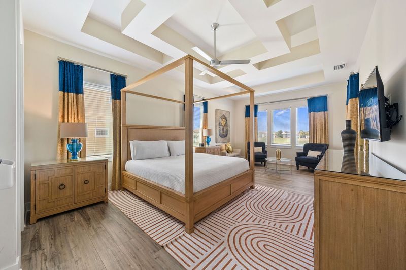 The upstairs Egyptian themed master suite with a sitting area to enjoy a nightcap before bed