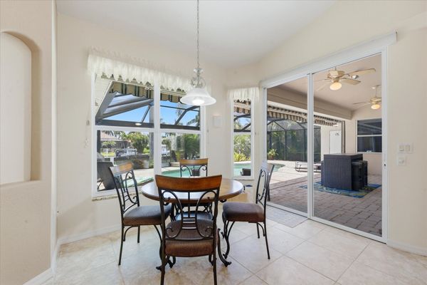 Kitchen nook overlooking lanai & pool