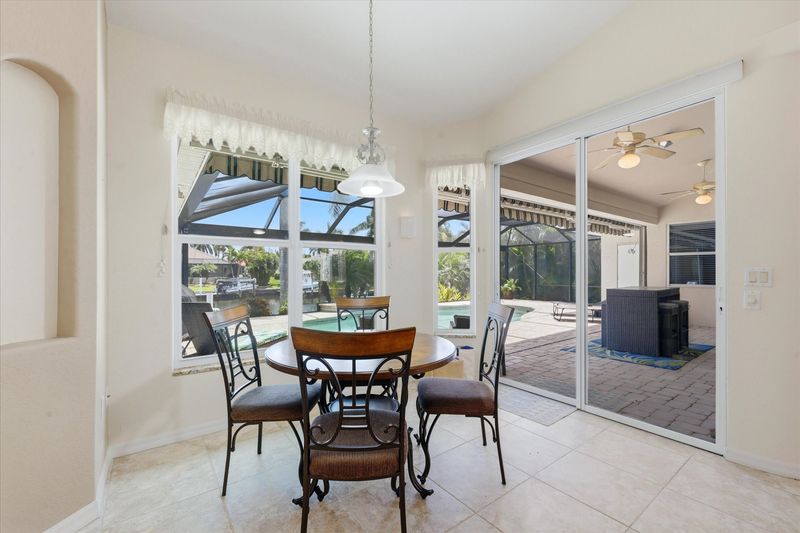 Kitchen nook overlooking lanai & pool