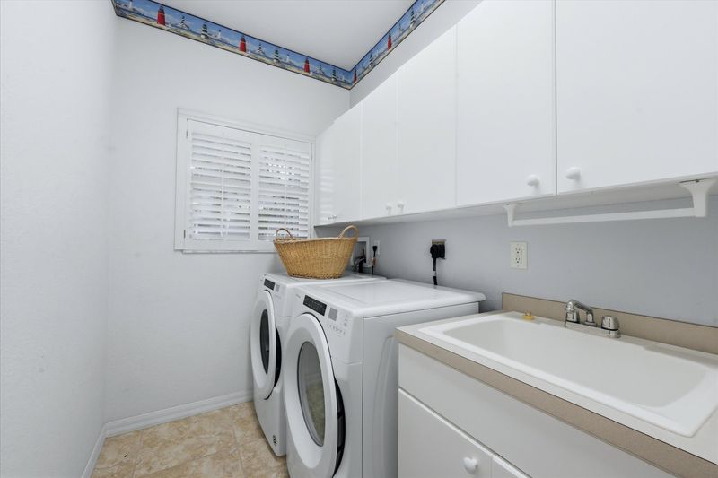 Laundry room with full-size washer & dryer