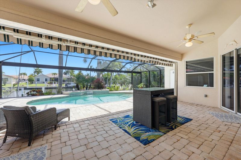 Large outdoor area overlooking the pool and canal