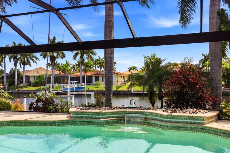 Sparkling pool overlooking the canal. Pool size: 28' x 14' x 6'D