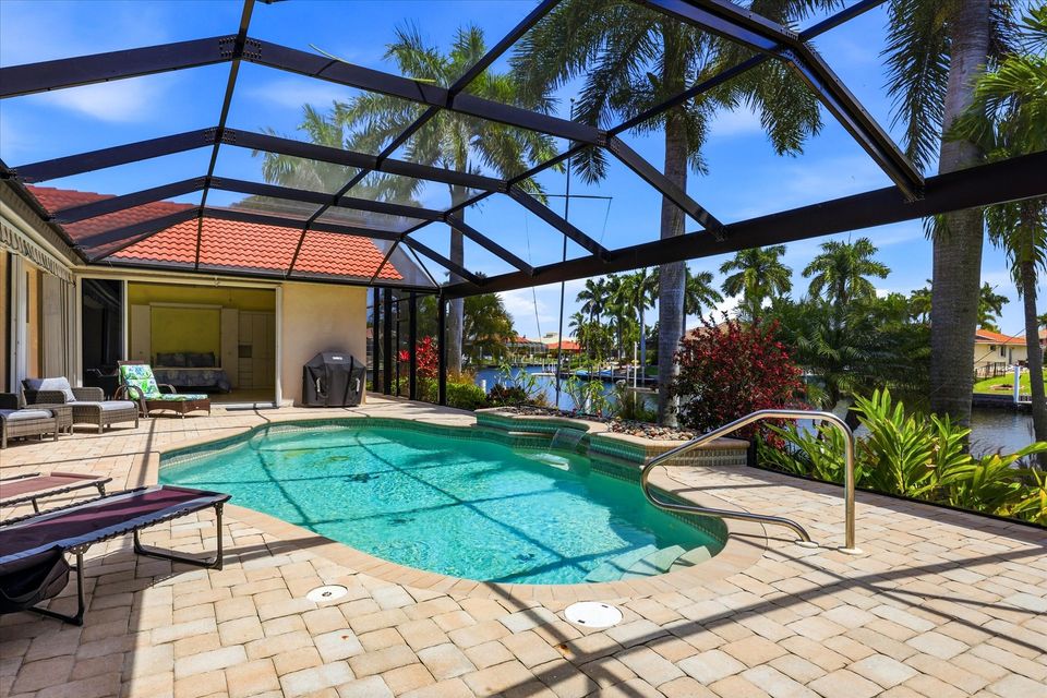 Sparkling pool overlooking the canal. Pool size: 28' x 14' x 6'D