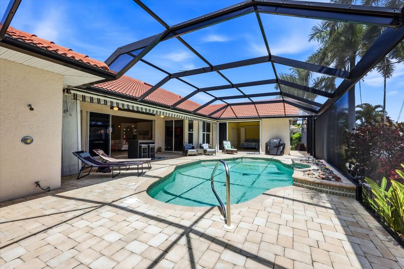 Sparkling pool overlooking the canal. Pool size: 28' x 14' x 6'D