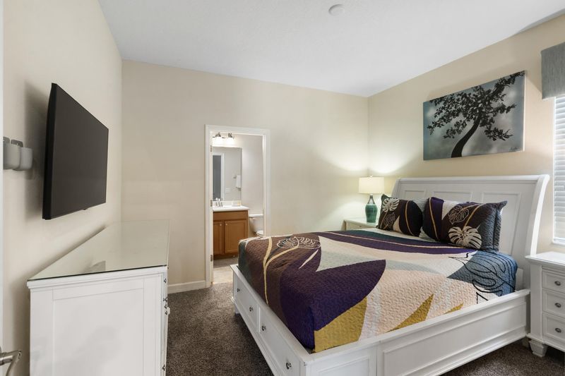 Queen Suite Bedroom Downstairs Attached Bathroom 43" Smart TV