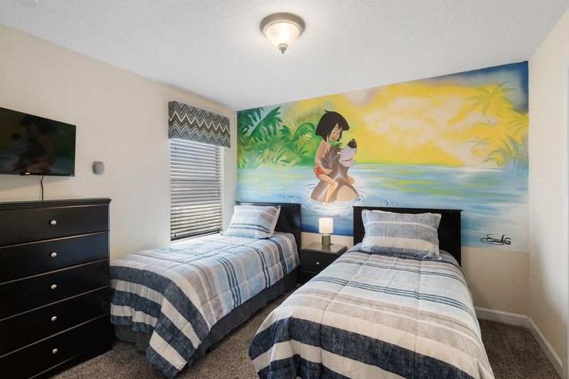 Two Twins Bedroom Upstairs 6 Shared Bathroom 
32" Roku TV
Jungle Book Theme