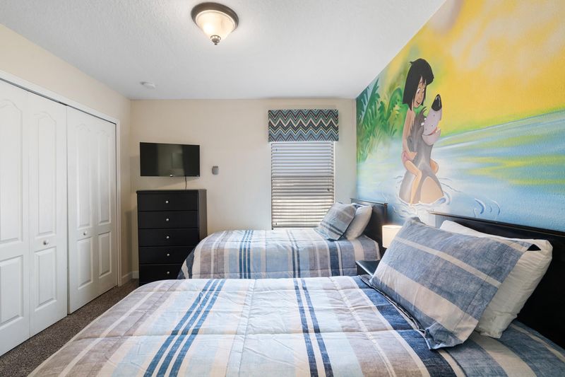 Two Twins Bedroom Upstairs 6 Shared Bathroom 
32" Roku TV
Jungle Book Theme