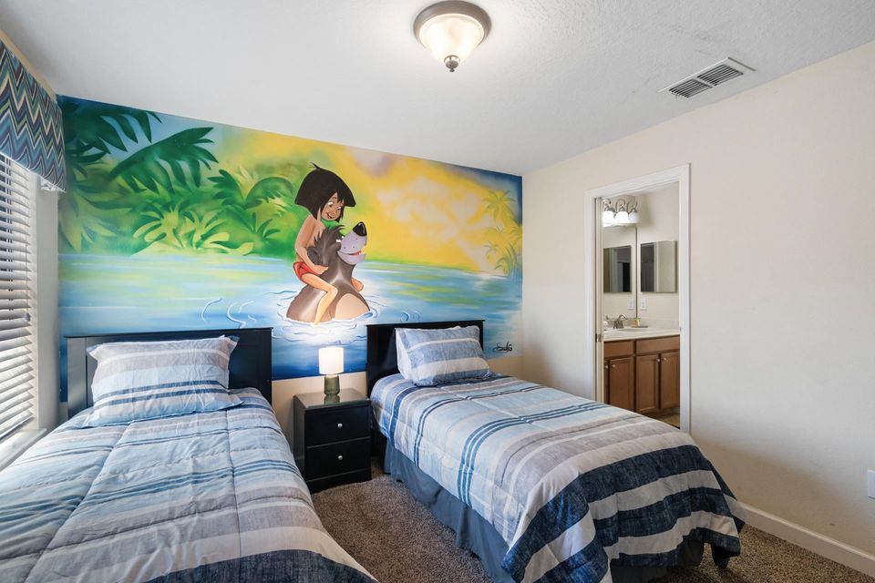 Two Twins Bedroom Upstairs 6 Shared Bathroom 
32" Roku TV
Jungle Book Theme