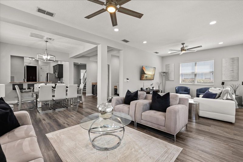 A modern living room where style meets comfort, perfect for family gatherings