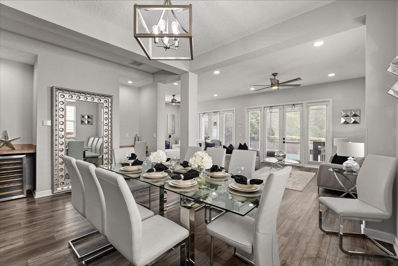 A modern dining room with a spacious design, ideal for family gatherings