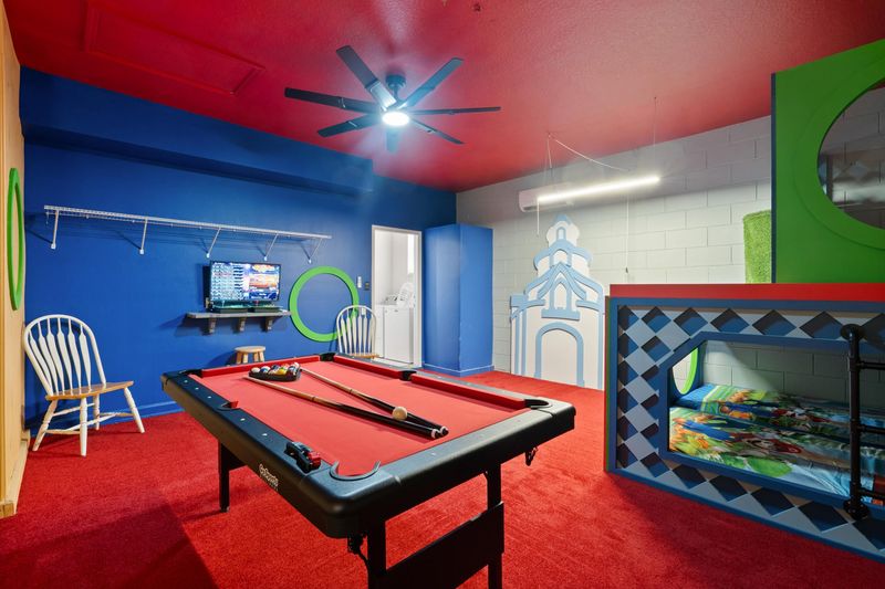 Game Room/Bunk Bedroom 4
One Twin Bed over Two Twin Beds
32" TV / 2 game consoles
Pool Table