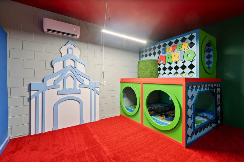 Game Room/Bunk Bedroom 4
One Twin Bed over Two Twin Beds
32" TV / 2 game consoles
Pool Table