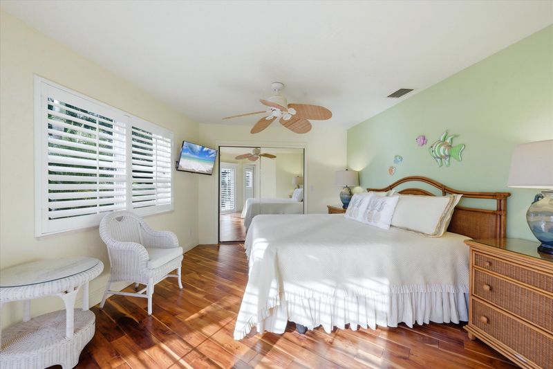 Guest bedroom 2 with king bed and 32-inch Smart TV