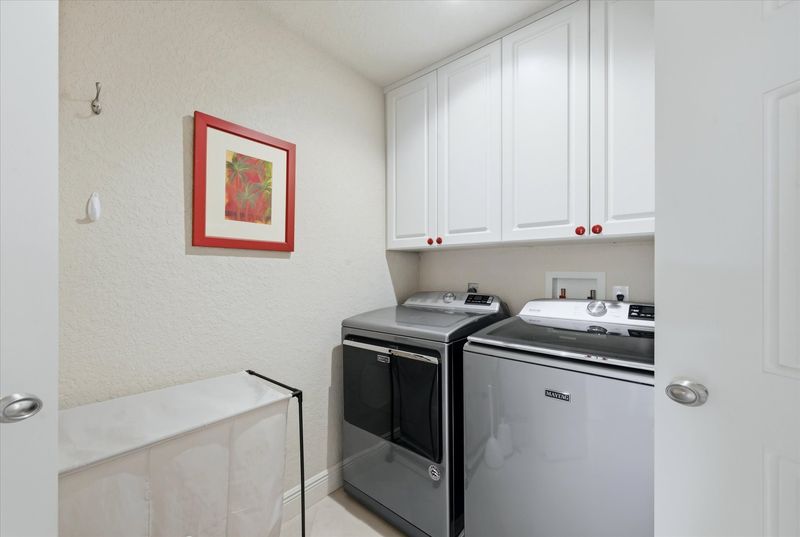 Laundry room with full-size washer & dryer