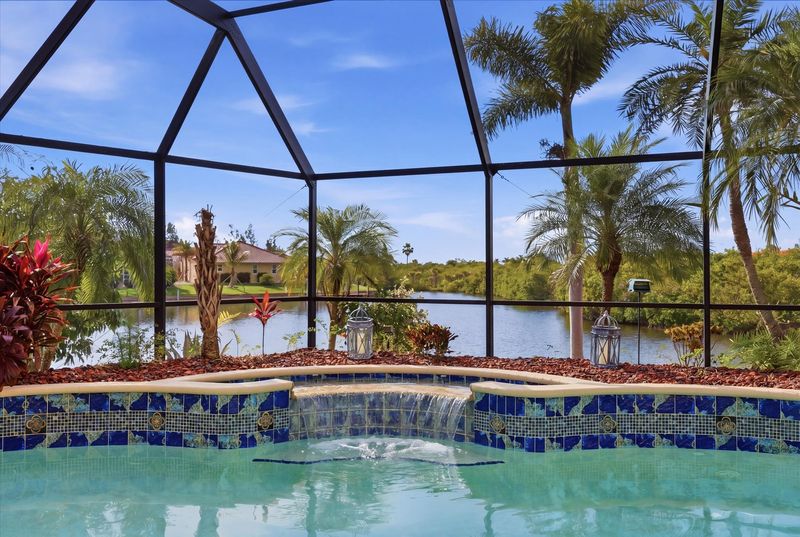 Sparkling pool & spa overlooking the canal. Pool size: 23' x 8' x 6'D