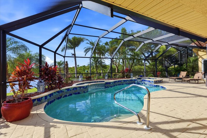 Sparkling pool & spa overlooking the canal. Pool size: 23' x 8' x 6'D