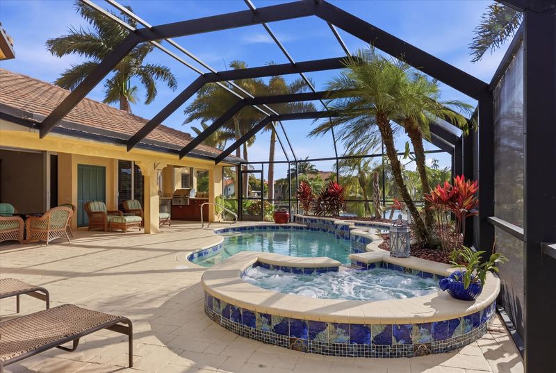 Sparkling pool & spa overlooking the canal. Pool size: 23' x 8' x 6'D