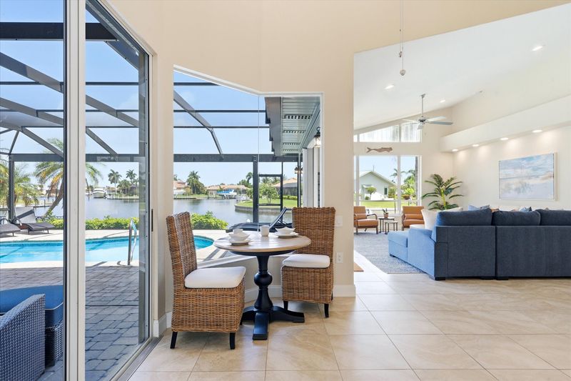 Kitchen nook overlooking the pool and canal
