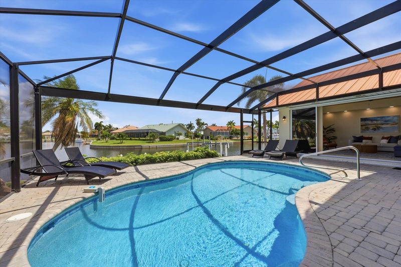 Sparkling pool overlooking the canal. Pool size 25' x 13' x 6'D