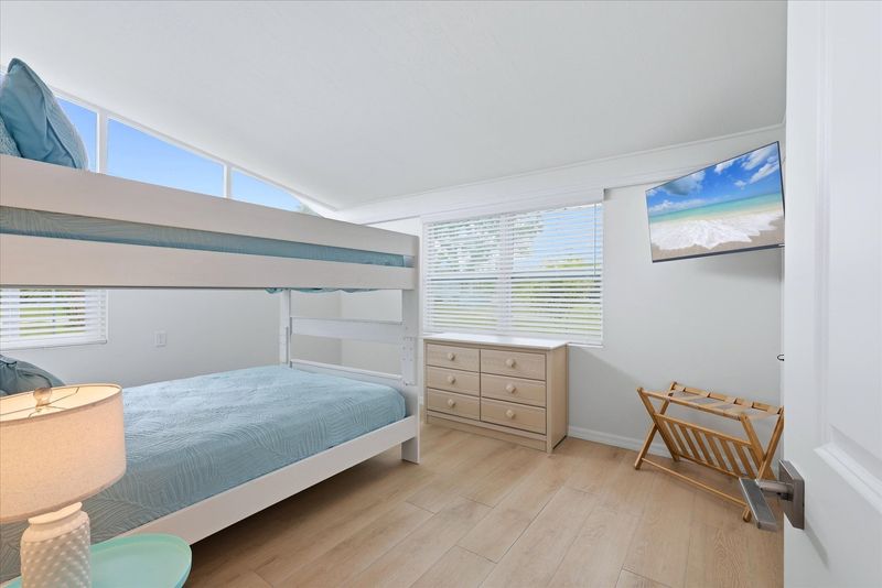 Bedroom 3 with a double over double bunkbed, and 40-inch Smart TV