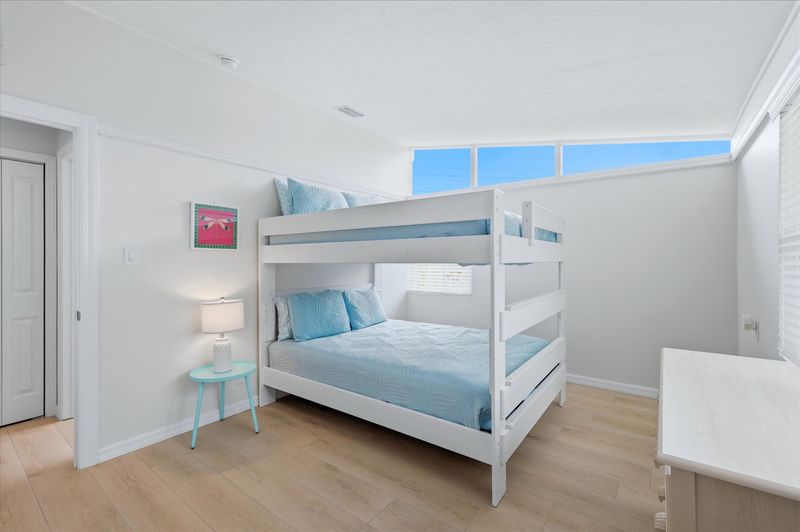 Bedroom 3 with a double over double bunkbed, and 40-inch Smart TV