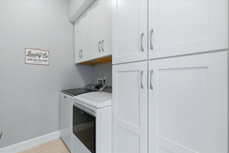 Laundry room with full-size washer & dryer