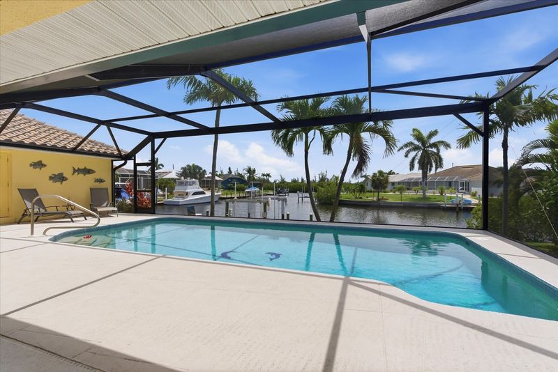 Sparkling pool overlooking the canal. Pool size: 29' x 13' x 6'D
