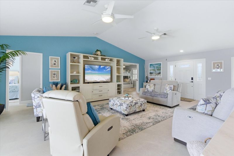 Bright, open living area with access to the lanai