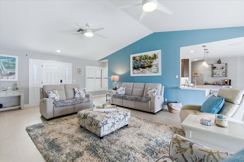 Bright, open living area with access to the lanai