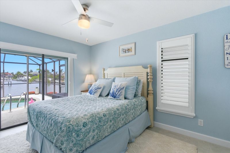 Bedroom 2 - one queen bed, lanai access, 43" Smart TV
