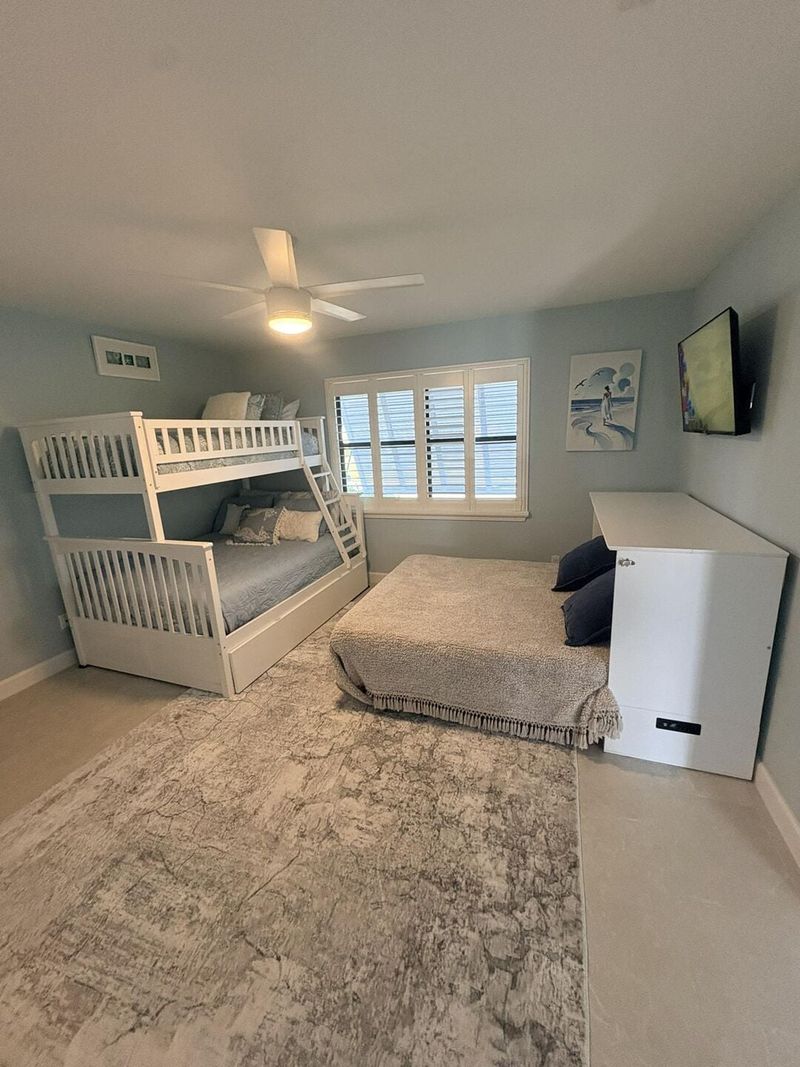 Bedroom 3 - Family Suite, Twin over Double Bunk bed with Twin Trundle Bed, Full size Murphy bed, 43" Smart TV, Large double doors