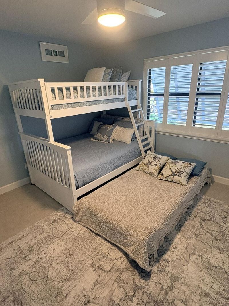 Bedroom 3 - Family Suite, Twin over Double Bunk bed with Twin Trundle Bed, Full size Murphy bed, 43" Smart TV, Large double doors