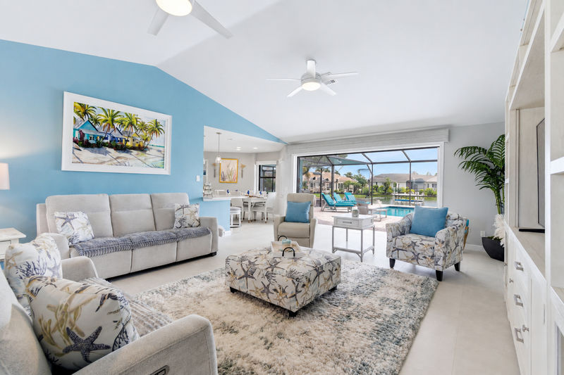 Bright, open living area with access to the lanai