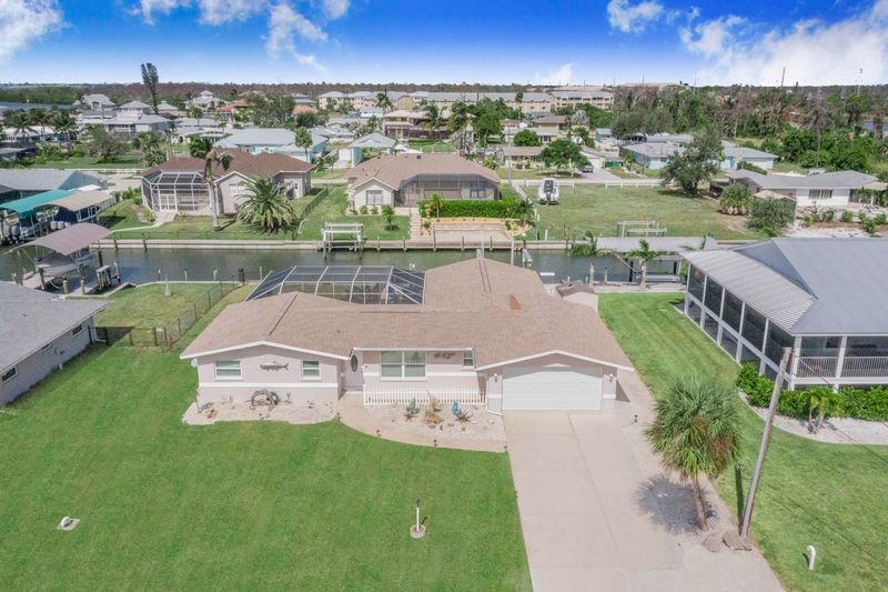 Beautiful 3 bedroom, 2 bathroom waterfront home with private pool & spa on Lemon Bay in Englewood (Boat Lift Not For Use)