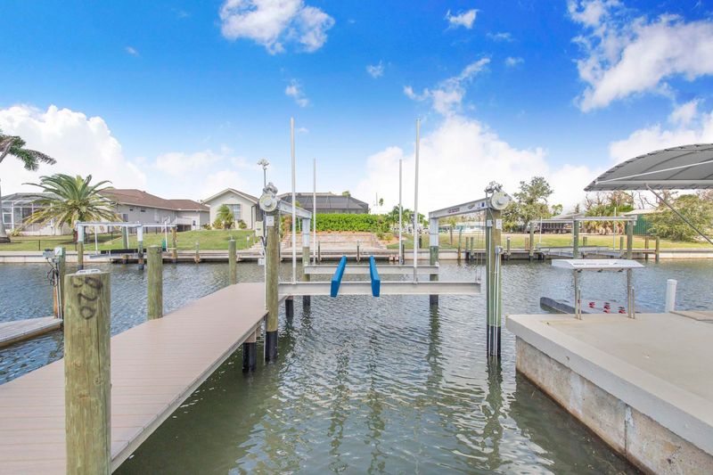 Two large docks. Docks include BBQ grill and fish cleaning station. Dock 1: 22' x 6'. Dock 2: 47' x 4' (boat lift not for use)