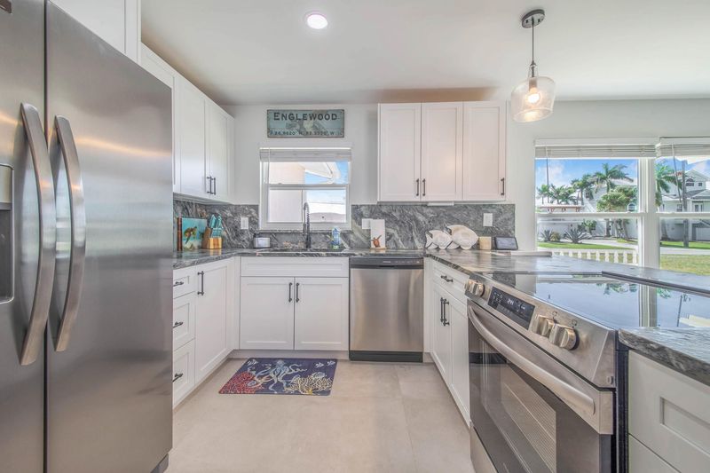 Bright, open, fully-equipped kitchen