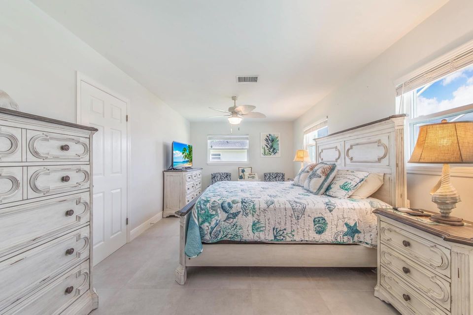 Primary bedroom with king bed and 43-inch Smart TV